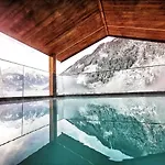 호텔 Alpenhotel Kramerwirt 4*